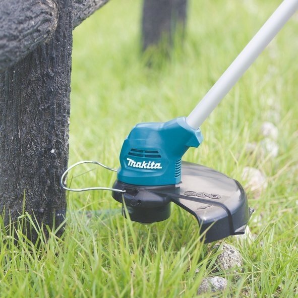 Akumuliatorinė žoliapjovė/trimeris Makita UR100DWAEX, 12V, 2,0Ah Li-ion 2 Akumuliatorinė žoliapjovė/trimeris Makita UR100DWAEX, 12V, 2,0Ah Li-ion 2