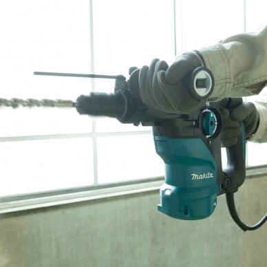 Perforatorius Makita HR3012FCJ, 1050 W, 30 mm, SDS-Plus 6 Perforatorius Makita HR3012FCJ, 1050 W, 30 mm, SDS-Plus 6